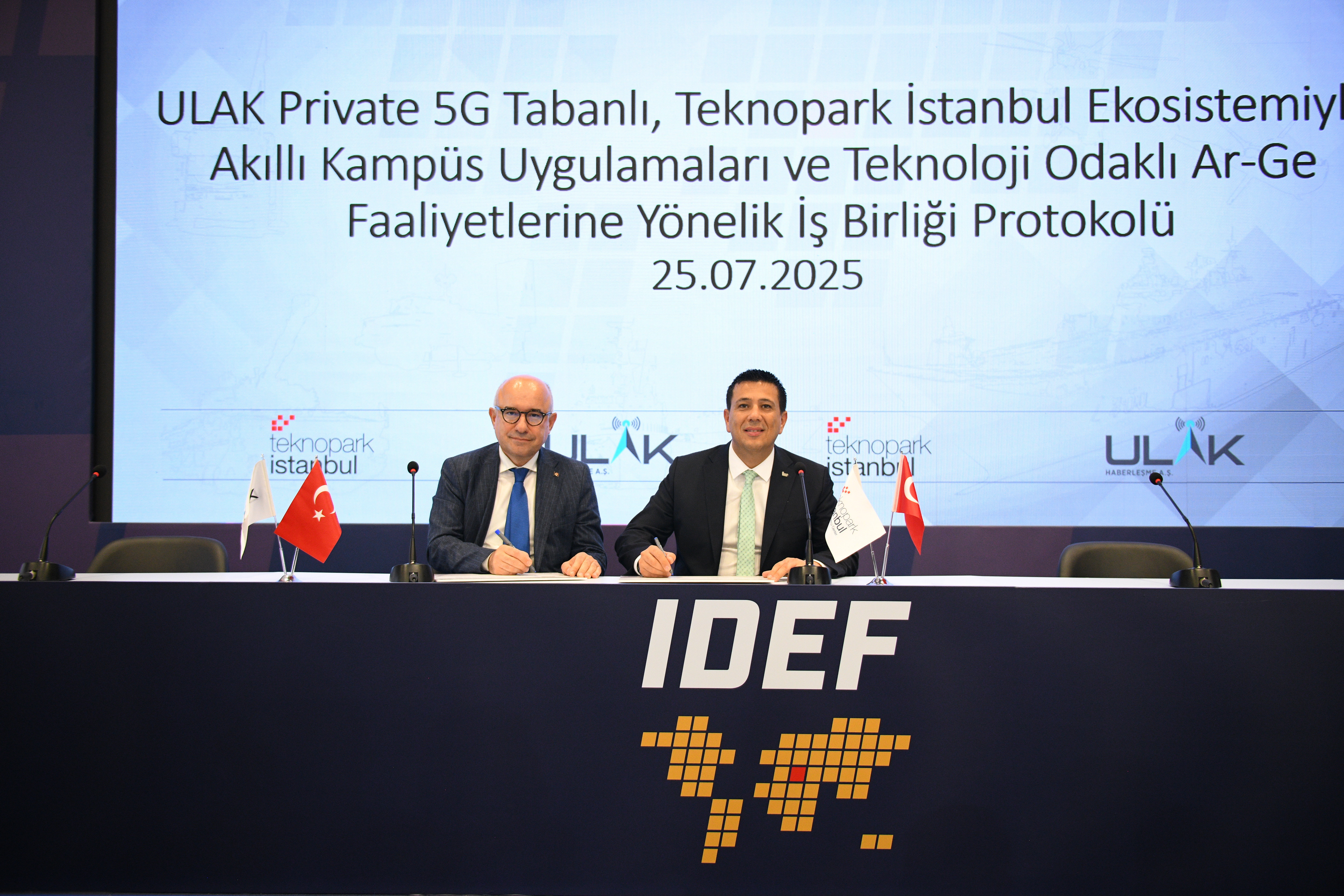 As part of IDEF2025, a significant collaboration protocol was signed with the participation of Teknopark Istanbul General Manager Prof. Dr. Abdurrahman Akyol and ULAK Communications General Manager Dr. Ragıp Ruşen Kömürcü.